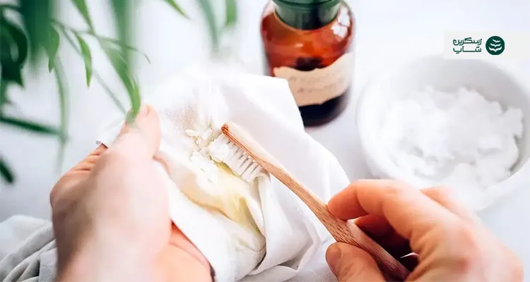 از بین بردن لکه لباس با جوش شیرین